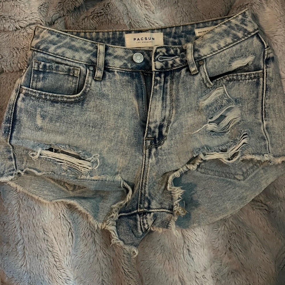Denim shorts fit perfectly and go between the sizes of 0-2
